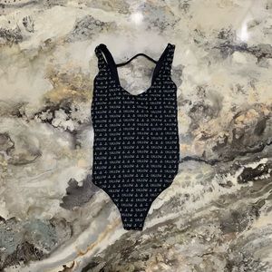 FREE PEOPLE (Tallow Swimwear) WOMAN’S REVERSIBLE BLACK ONE PIECE.  SIZE 2 (US)